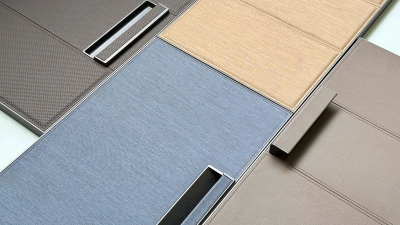 Historical GM097 collection showing woven material, leather-look panels, stitching and handles