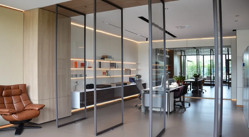 Slender glass partitions in a past Gainer office project