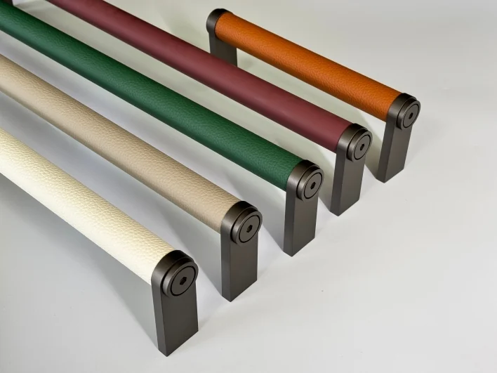 Gainer GNN2927 round leather-wrapped rails with end fittings, in example finishes